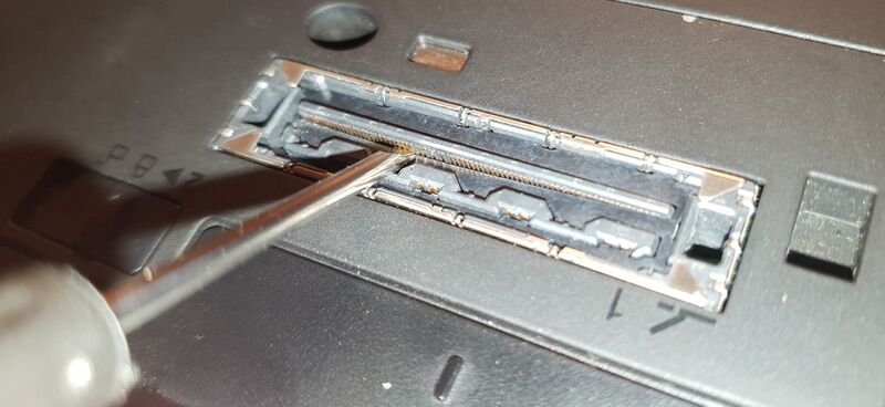 File:Short these pins to turn on some thinkpads, alternative angle.jpeg